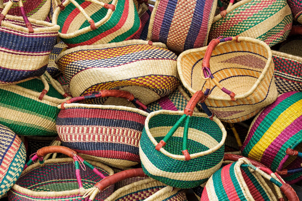 Colourful woven baskets and lids