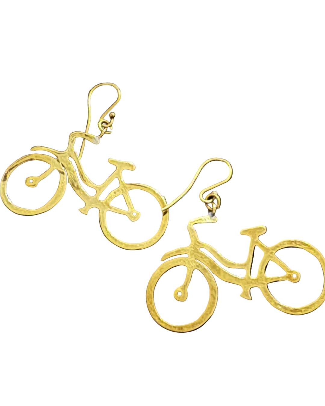 A pair of gold bicycle-shaped dangle earrings on a textured black fabric background.