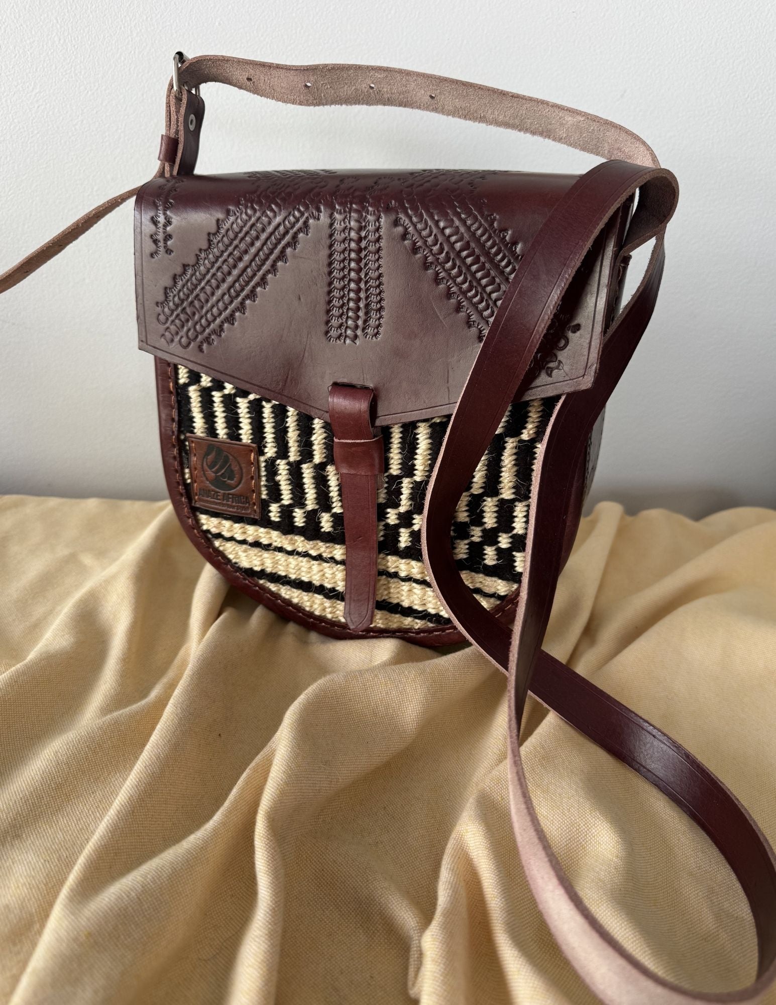 The Amani Saddle Crossbody