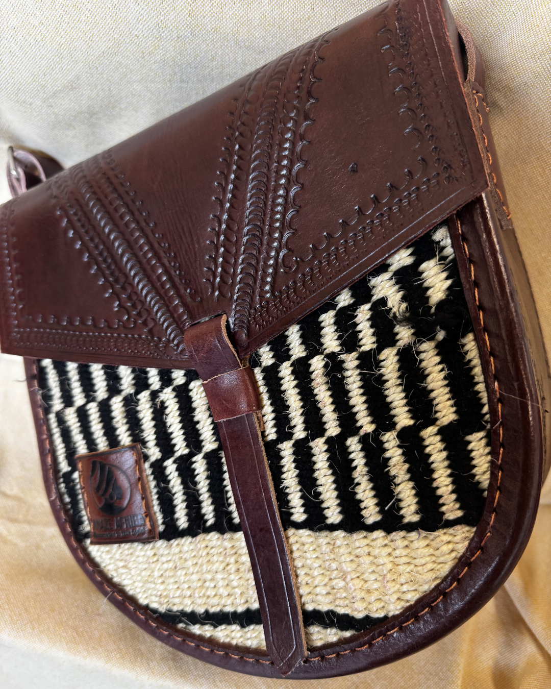 The Amani Saddle Crossbody