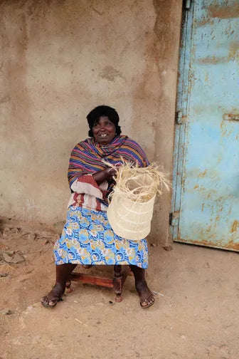 Woman preparing sisal fibre