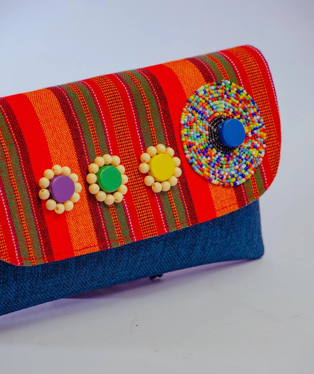 Swahili clutch in striped textile and beadwork